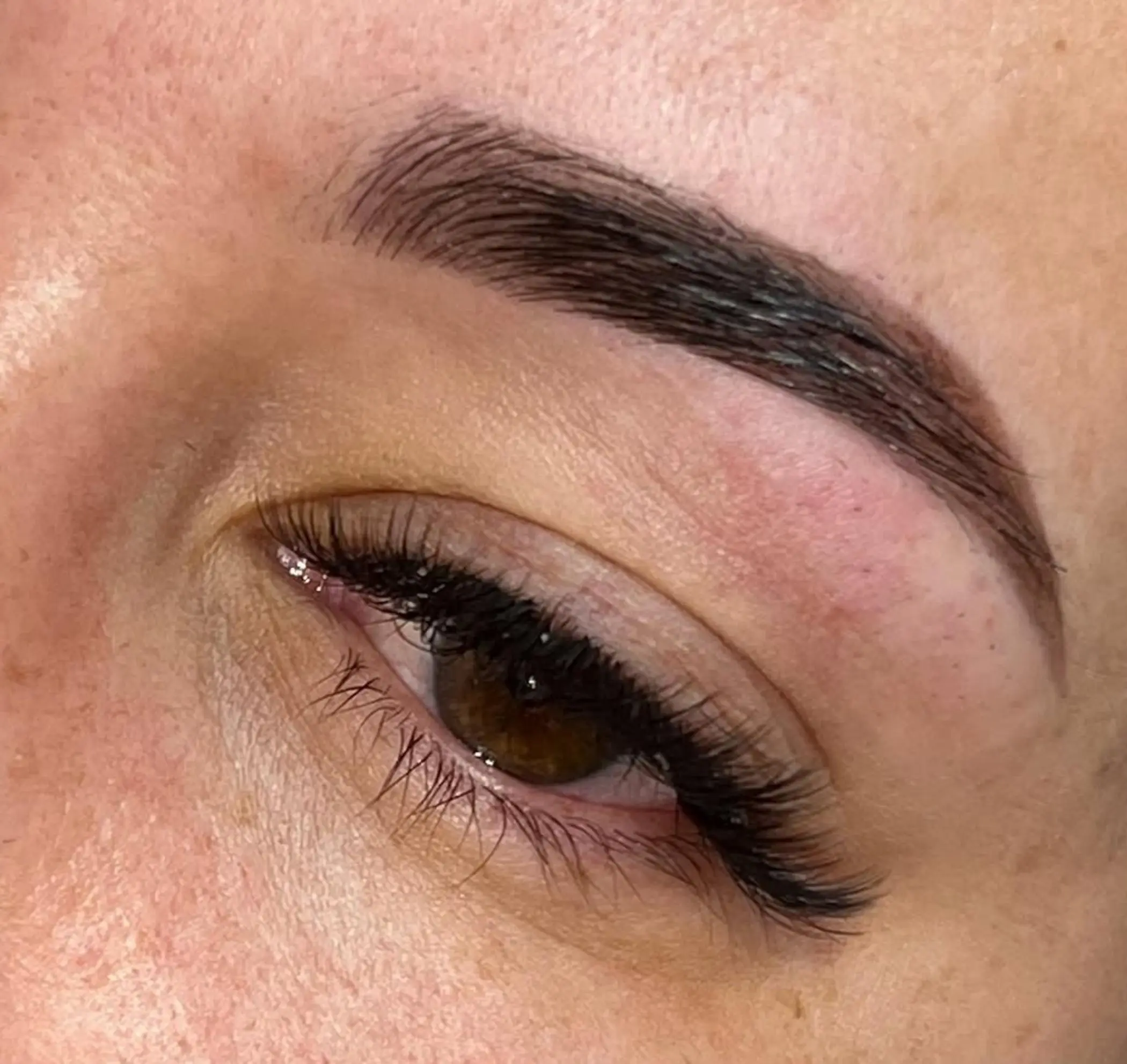 microblading technician working on client brows
