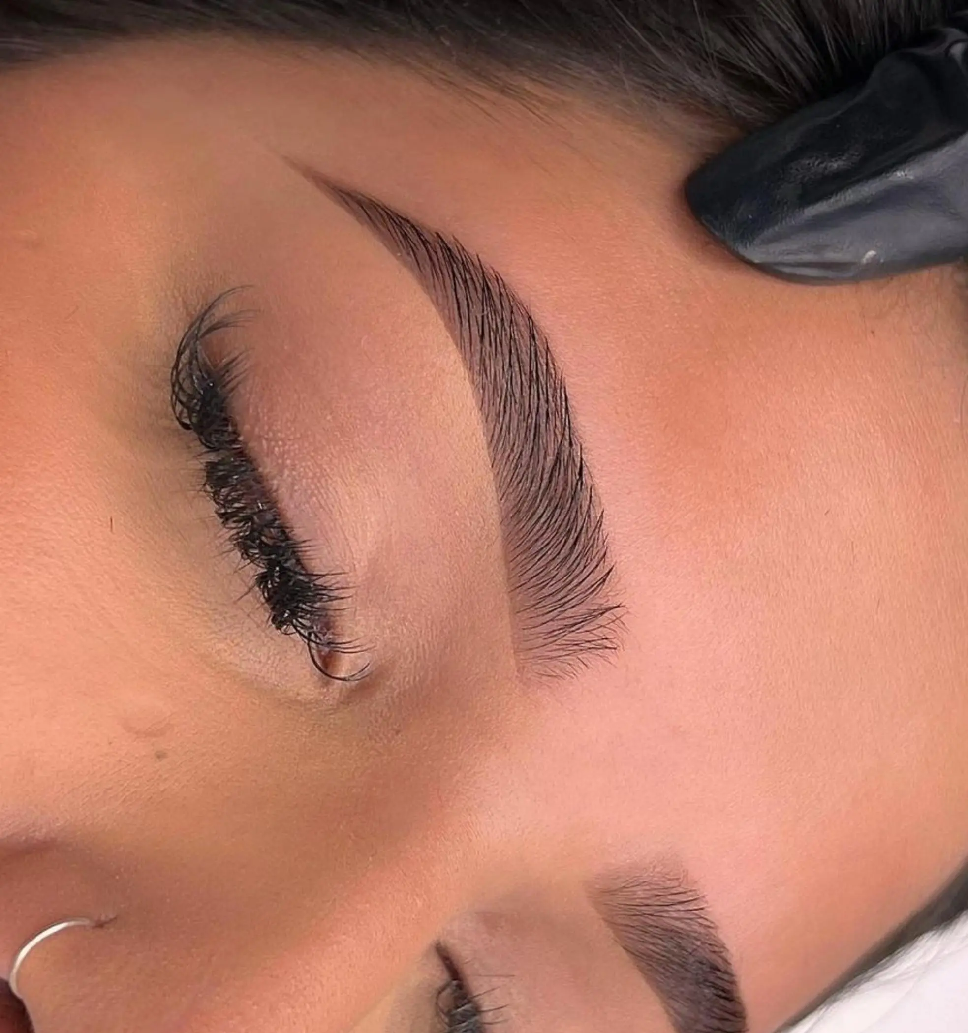 natural looking feathered eyebrows close up